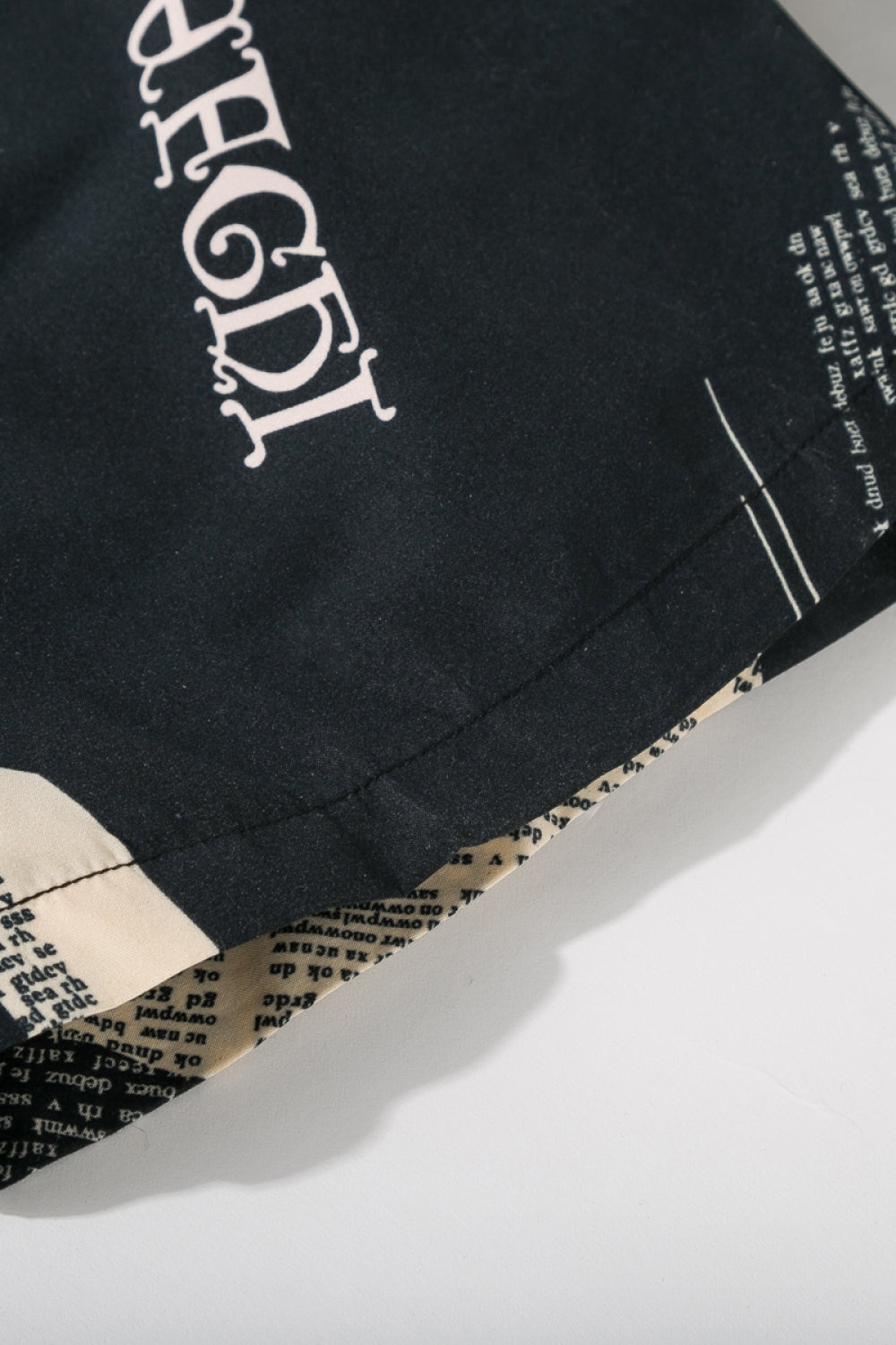 Full Size Newspaper Print Drawstring Waist Swim Trunks