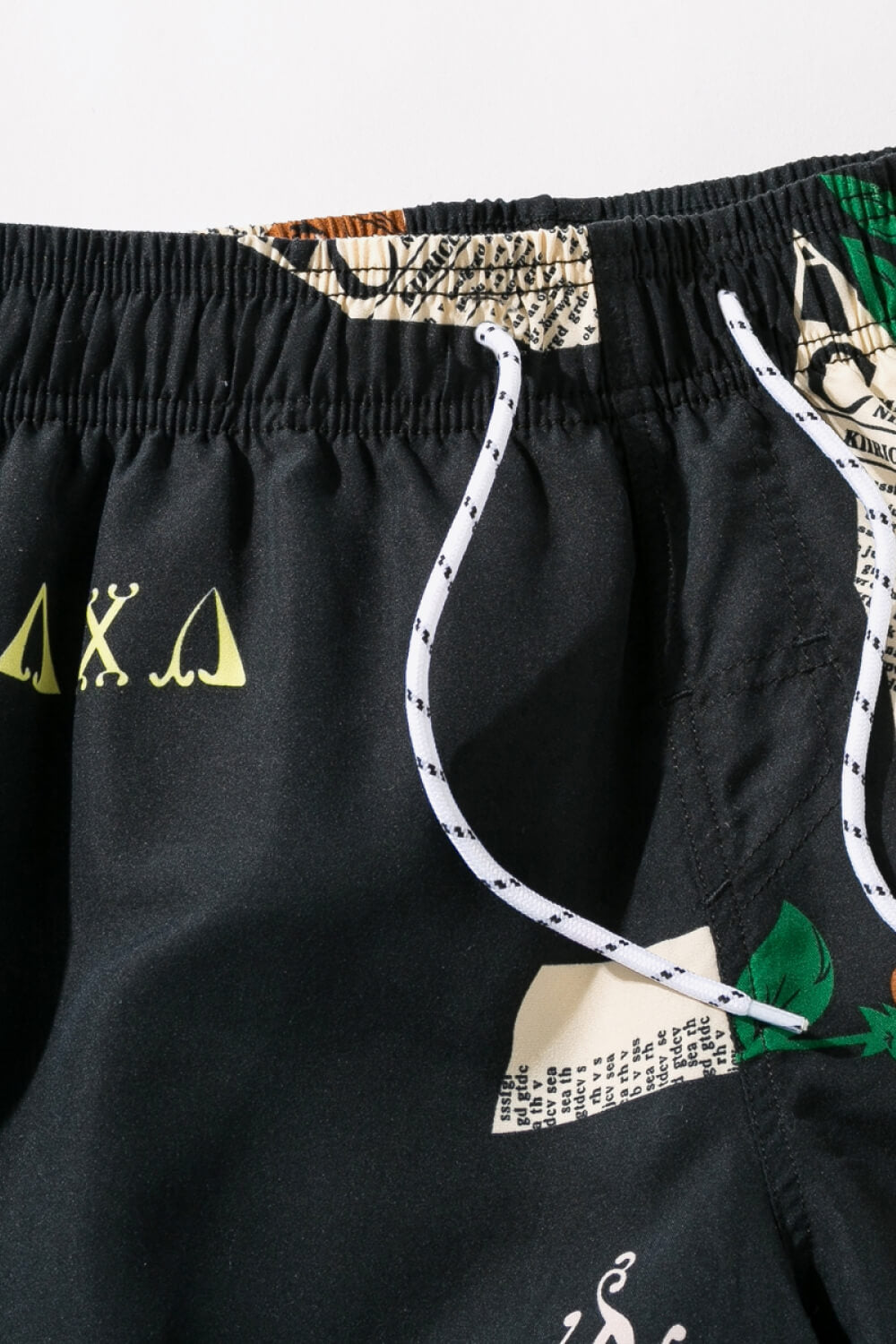 Full Size Newspaper Print Drawstring Waist Swim Trunks