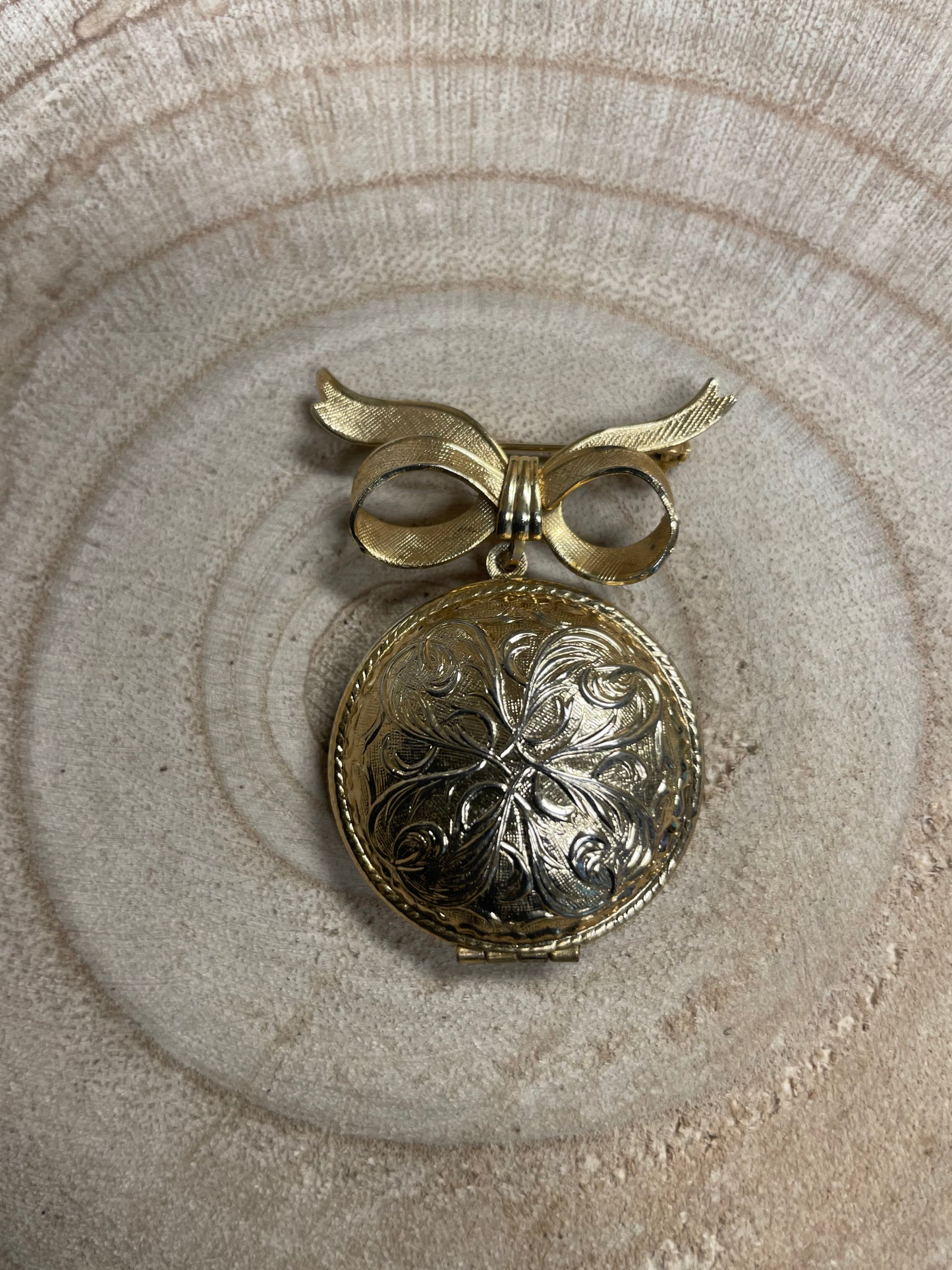 Vintage Avon locket brooch